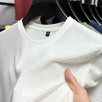 Olive Green Waffle Knit Sweater with long sleeves, featuring a textured pattern and a collar, designed for unisex fall fashion.
