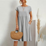 Olive green women's casual summer midi dress with short sleeves and a crew neck, showcasing a relaxed fit around the waist.