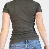 Olive green women's cotton short sleeve casual t-shirt displayed on a mannequin with focus on the round neckline and shoulder details.