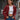 
A woman wearing a wine red oversized utility jacket with a cropped design, featuring a fashionable street style. The jacket has long sleeves, a collar, and button details, paired with eyewear and a confident smile.