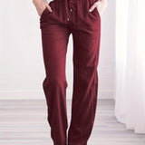 A pair of olive green women's drawstring pants with a relaxed fit, lightweight and breathable material.
