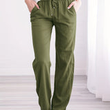Olive green women's drawstring pants in size 5XL (54), featuring a lightweight, relaxed fit and breathable fabric.