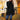
A woman wearing a black elegant slim fit trench coat suitable for fall and winter fashion, featuring a tailored waist, long sleeves, and a classic collar. She is standing in a pose that highlights the coat's design.