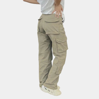 Olive green women's slim fit tactical cargo pants with multiple pockets, featuring a military-inspired camouflage design.