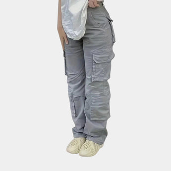 Olive green women's slim fit tactical cargo pants with pockets, featuring a high waist, knee and thigh detailing, suitable for workwear or sportswear.