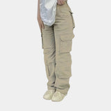 Olive green women's slim fit tactical cargo pants with multiple pockets in a khaki color, displayed in an XL size.