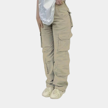 Olive green women's slim fit tactical cargo pants with multiple pockets in a khaki color, displayed in an XL size.