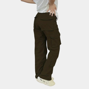Olive green women's slim fit tactical cargo pants featuring multiple pockets, designed for a stylish and functional fit.