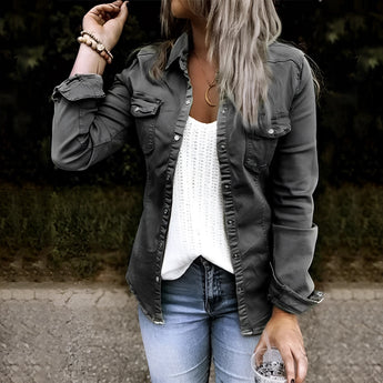 
A black women's slim fit utility jacket designed for casual fall fashion, with long sleeves and a stylish collar, paired with jeans. The jacket is shown in a size 2XL.