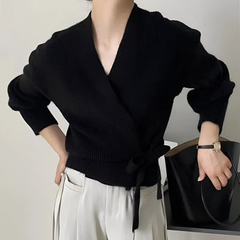 Olive green women's V-neck wrap sweater featuring long sleeves and a casual chic design, perfect for autumn fashion.