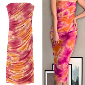 One-shoulder pink and orange tie-dye evening dress featuring a flowing elegant design, showcasing a fitted waist and asymmetrical shoulder style.