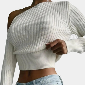 One-shoulder ribbed knit crop top in white for women, featuring an asymmetric design with long sleeves, displayed on a mannequin.