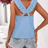 Orange sleeveless tank top with criss-cross back, featuring a stylish and casual summer design for women.