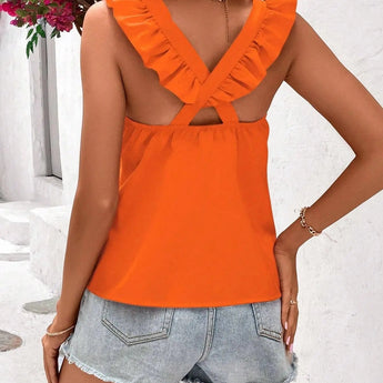
A woman's sleeveless orange tank top with a criss-cross back design, ideal for summer fashion. The top is styled on a mannequin or model showcasing the shoulder, neck, and arm areas, highlighting the vibrant orange color and intricate back detailing.