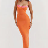 Orange lace trim spaghetti strap corset dress featuring a fitted bodice, delicate lace detailing on the edges, and a flattering neckline, perfect for summer fashion and casual daytime wear.