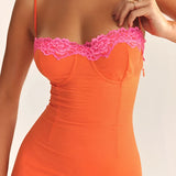 Orange lace trim spaghetti strap corset featuring a form-fitting silhouette with delicate lace detailing, suitable for summer fashion.