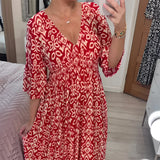Orange and white geometric V-neck summer dress featuring a cinched waist, shown in a red color variant, size 5XL.