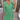 Orange and white geometric patterned V-neck summer dress with a cinched waist, shown in a green color and size 5XL. The dress features short sleeves and a comfortable fit, ideal for warm weather.