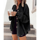 
A black oversized corduroy jacket designed for women, featuring long sleeves and a casual fall fashion style in size 2XL.