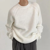 Oversized black ribbed knit sweater for men in a relaxed fit, featuring a crewneck design and long sleeves, shown in size XL.