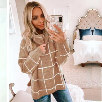 Oversized black and white checkered jacket with beige accents, featuring long sleeves and a wide shoulder design; suitable for plus size with an XL fit, covering waist to thigh length.
