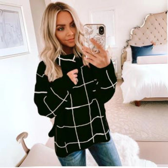 Oversized black and white checkered jacket in plus size, featuring a stylish pattern, long sleeves, and a comfortable fit.