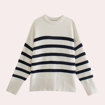 Oversized black and white chunky knit striped sweater with a crewneck design, featuring long sleeves and a bold pattern, suitable for unisex wear in size large.