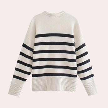 Oversized black and white chunky knit striped sweater with a crewneck design, featuring long sleeves and a bold horizontal pattern. Suitable for unisex wear.