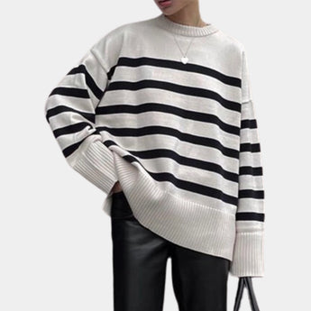 Oversized black and white chunky knit striped sweater, unisex crewneck, featuring long sleeves and a relaxed fit.