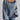 Oversized blue houndstooth chunky knit sweater for women, featuring a cozy winter fashion design, with a 2XL size fit, paired with jeans.