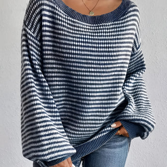 Oversized blue houndstooth chunky knit sweater for women, featuring a cozy winter fashion design, with a 2XL size fit, paired with jeans.