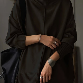 Oversized burnt orange women's crewneck sweater in chunky knitwear, showcasing long sleeves and a relaxed fit.
