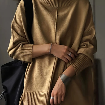 Oversized burnt orange women's crewneck sweater in chunky knitwear, featuring a cozy fit and long sleeves, perfect for stylish layering in cooler weather.