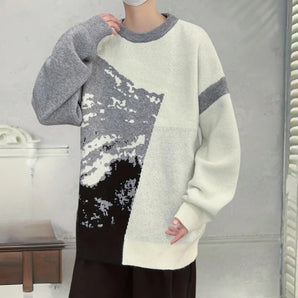 Oversized color block sweater featuring a bold wolf print design in a unisex style, showcasing white and colorful knitwear ideal for winter fashion.