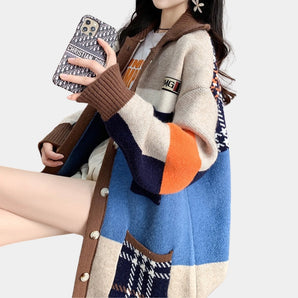 Oversized color block women's cardigan featuring a geometric autumn knitwear design with long sleeves and a cozy collar.