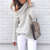 Oversized cowl neck knit sweater in a chunky and cozy style, featuring long sleeves and a relaxed fit in a 3XL size, showcasing a white textile with a subtle tartan pattern.
