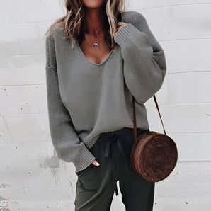 Oversized dark gray V-neck sweater with chunky knit design for women, featuring long sleeves and a relaxed fit in size XXL.