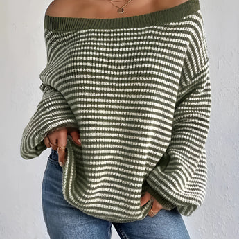 Oversized green striped knit sweater featuring a cozy boat neck design in size 2XL, worn by a person with visible arms, shoulders, and hair.