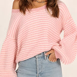 Oversized pink striped knit sweater with a cozy boat neck design, shown in 2XL size.
