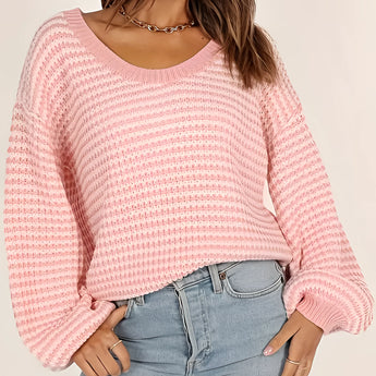 Oversized green striped knit sweater with a cozy boat neck design, featuring long sleeves and a relaxed fit.