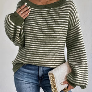 Oversized green striped knit sweater with a cozy boat neck pullover design, featuring long sleeves and a relaxed fit.