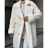 Oversized grey faux fur coat with long sleeves and a stylish collar, featuring a button-up design ideal for cozy chic winter fashion.