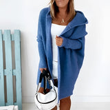 Oversized grey hoodie dress in a cozy knit fabric with pockets, displayed in a blue color and XL size, featuring long sleeves, a neckline with a collar, and a relaxed fit.