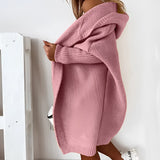 Oversized grey hoodie dress made from cozy knit material, featuring a relaxed fit with long sleeves, a comfortable neckline, and practical pockets, ideal for casual outerwear.