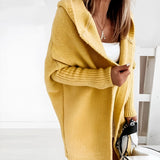Oversized yellow hoodie dress in XL size featuring a cozy knit material with a casual fit, long sleeves, and convenient pockets.
