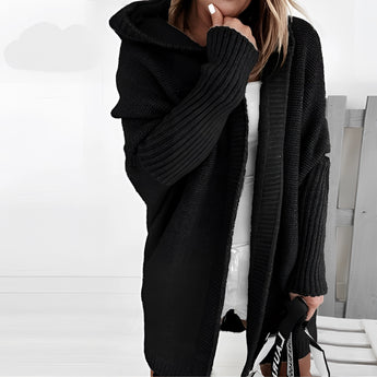 Oversized grey hoodie dress featuring a cozy knit design with pockets, shown in a black XL variant, highlighting the shoulder, neck, and sleeve details.