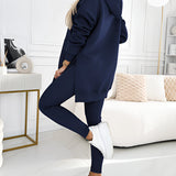 Oversized grey hoodie and leggings set displayed on a mannequin, showcasing trendy urban streetwear style with a focus on shoulder, sleeve, waist, and thigh details.