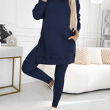 Oversized grey hoodie and leggings set in marine blue, styled for trendy urban streetwear with a focus on comfort and fashion.