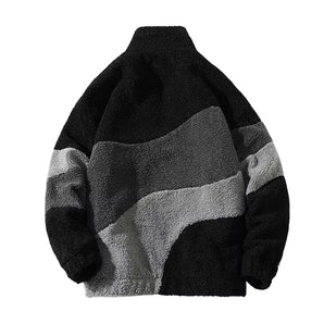 Oversized men's black and gray striped sherpa fleece jacket with long sleeves and a collar.