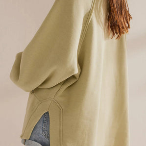 Oversized pistachio hoodie for women featuring a pastel beige color with long sleeves, a relaxed fit, and a cozy collar.